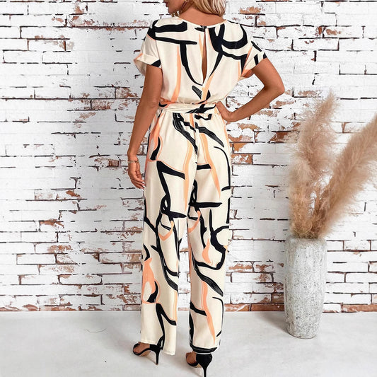 Dame retro-jumpsuit med mønster, talje og elegant pasform og korte ærmer