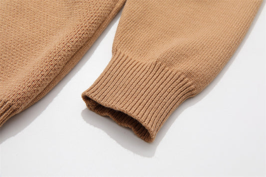 Striktrøje med stjernekors og rund hals fra Trendy Brand