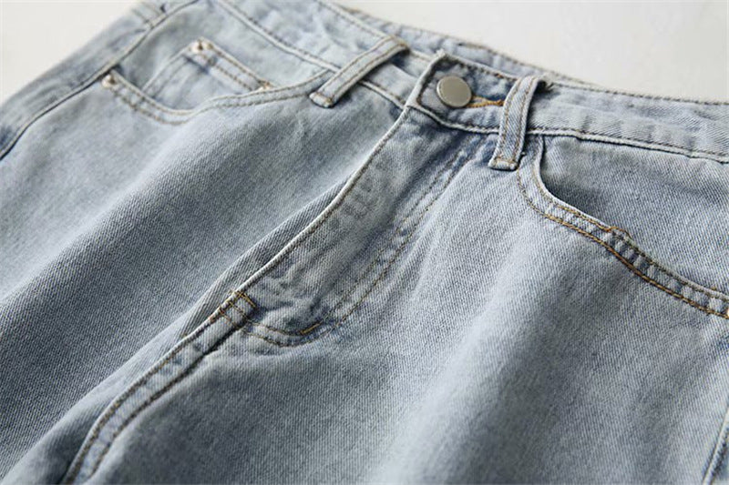Women's ripped jeans are thin and loose in summer