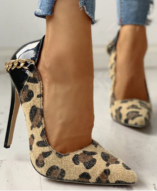 Pointed toe slip-on high heels with metal decoration