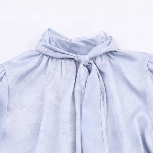 Sleek Jacquard Silk-textured Blouse With A Bow Detail