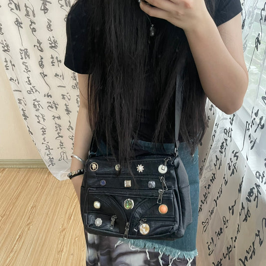 Vintage skuldertaske med knap, lynlåse og vasket look