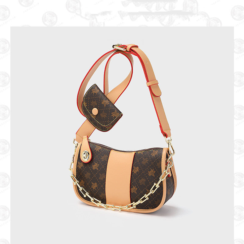 Skuldertaske med print under armen