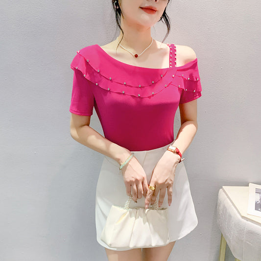 Off-the-shoulder-top med flæser og korte ærmer