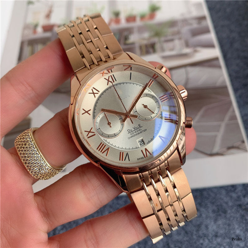 Moderigtigt armbåndsur i rustfrit stål med multifulle femvisere og kalender i trendy afslappet design