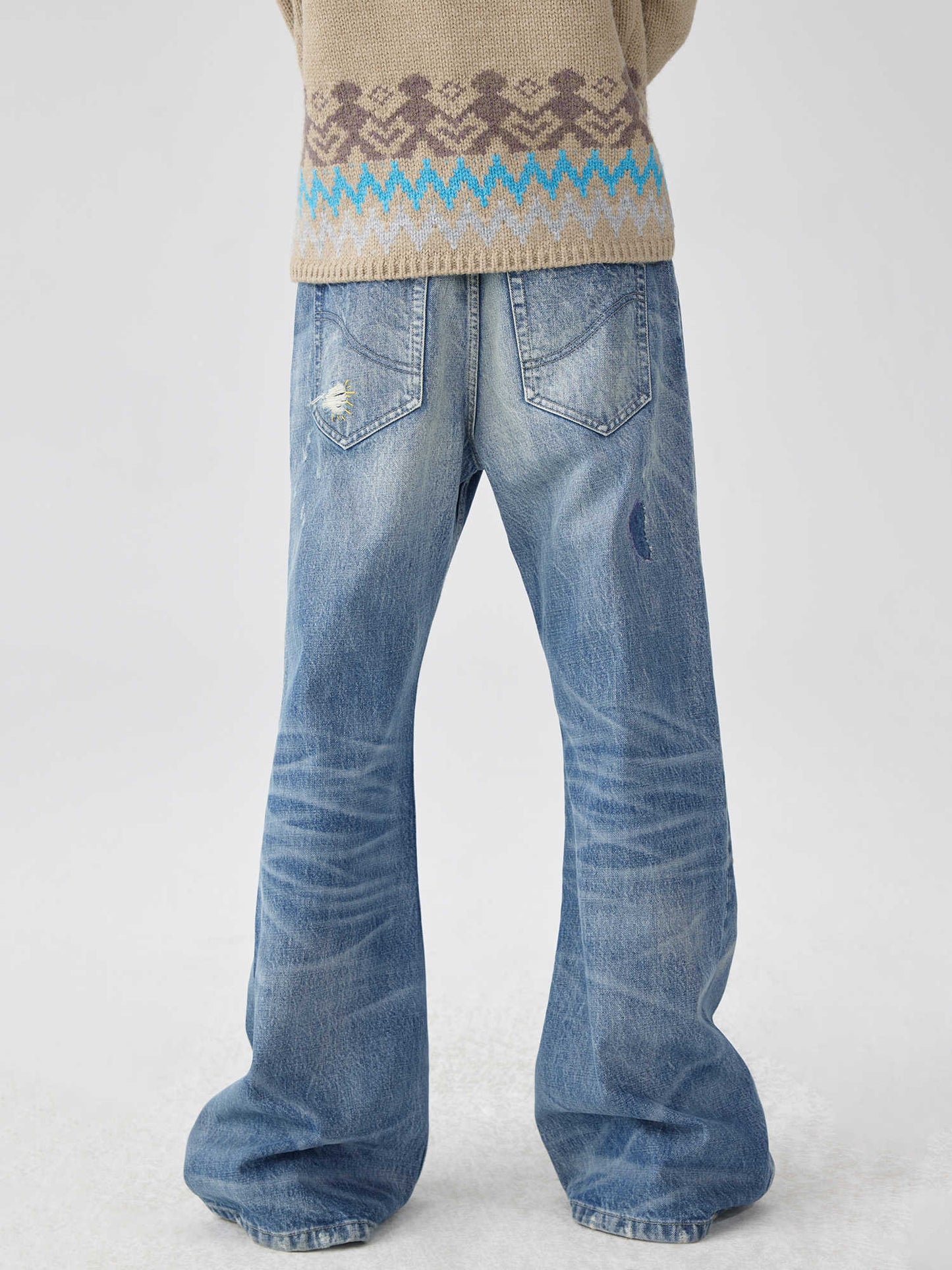 Vaskede Blå Patch Color Flared Jeans med Sømspor