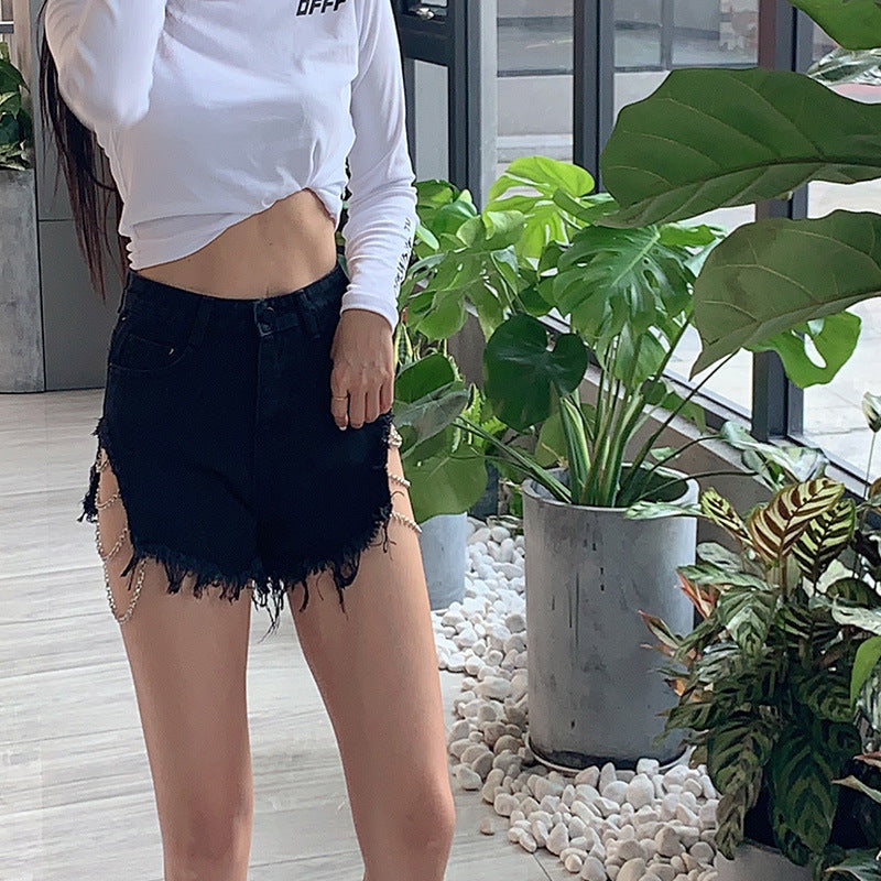 Cutout open-waist chain denim shorts