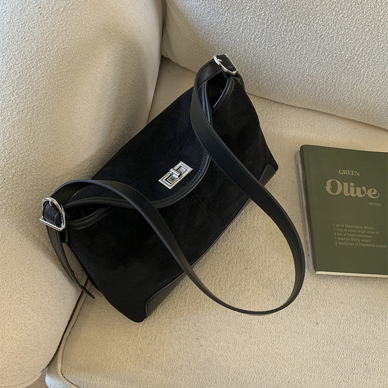 Stilfuld Skuldertaske/Crossbody i Ruskind med Drejelås