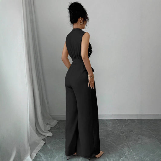 Sort Prikket Ærmeløs Jumpsuit Med Vide Ben Og Rund Hals