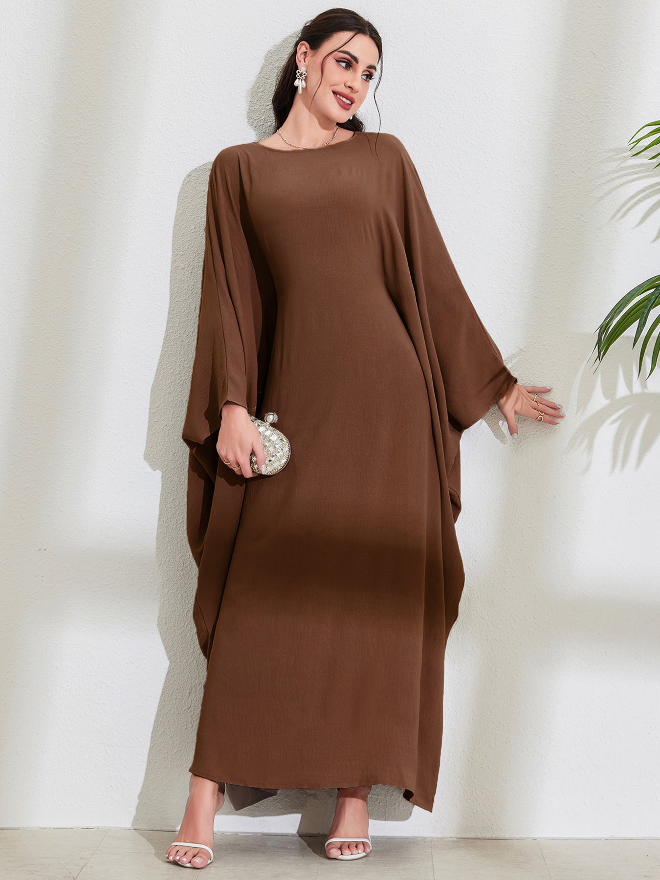 Long Dress With Tie Details Batwing Sleeves And A Round Necklinestylish And Elegant