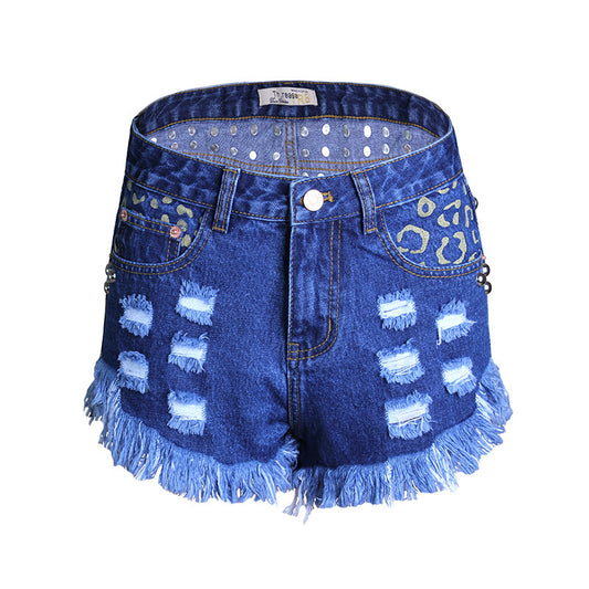 Varmt salg: Rippede løse højtaljede nitte-denimshorts med print
