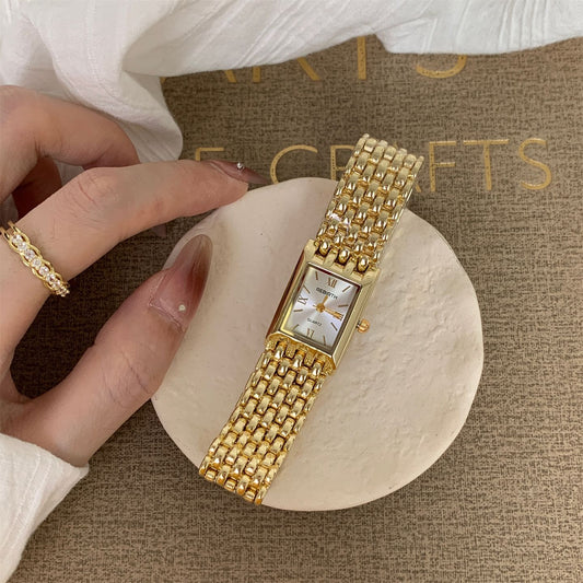 Golden Quartz Rectangular Watch With A Steel Band For Women