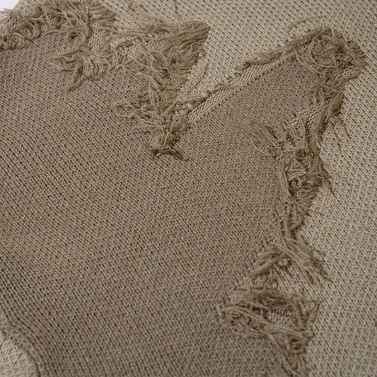 Strikket sweater med rund hals, lange ærmer og pelsbesat kant