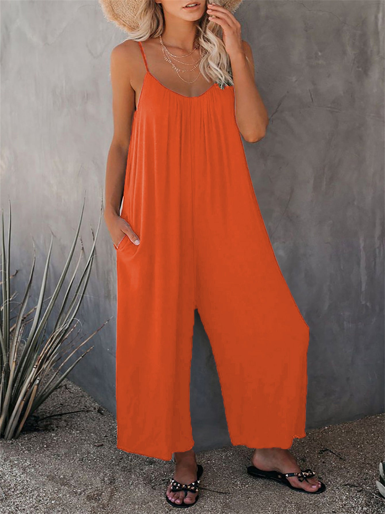 Dame Jumpsuit med ensfarvet lomme, løs pasform og afslappet design