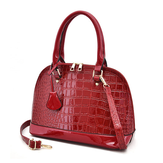 Stor skinnende skuldertaske/crossbody