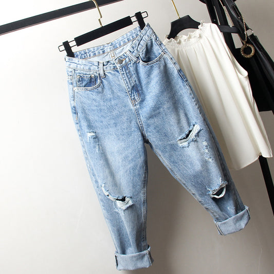 Oversized women's ripped jeans