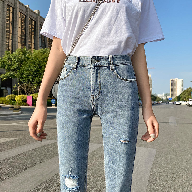 Lyseblå Ripped Jeans Til Kvinder Tynde Og Lange Ni-punkts Pencil Benbukser