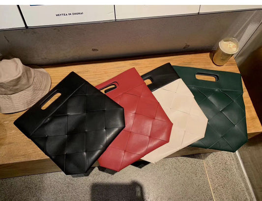 Embossed woven handbag folding clutch