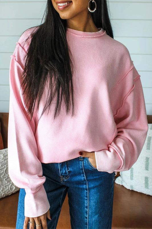Ensfarvet sweatshirt til kvinder med rund hals, lav skuldersøm og lange ærmer