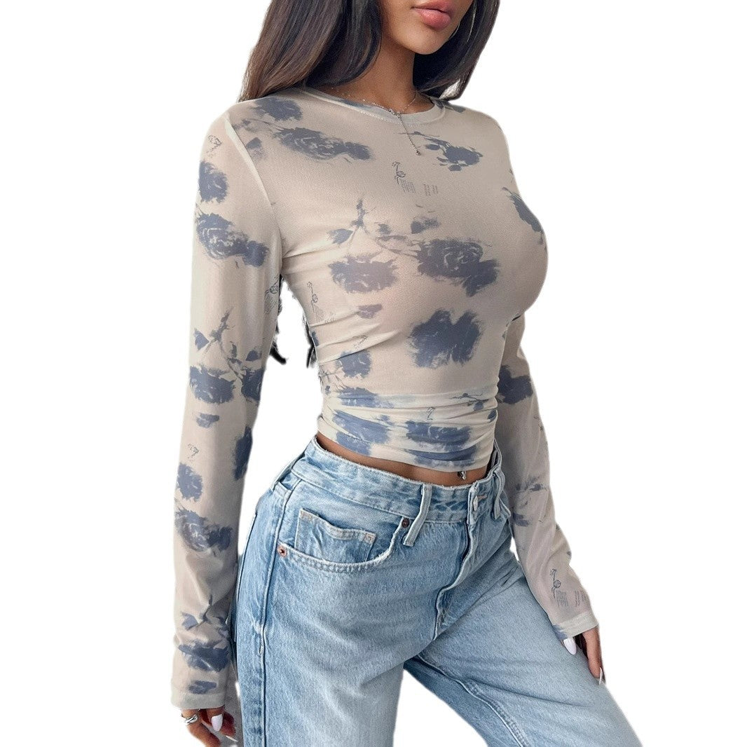 Bluse med blomstret print i mesh til kvinder