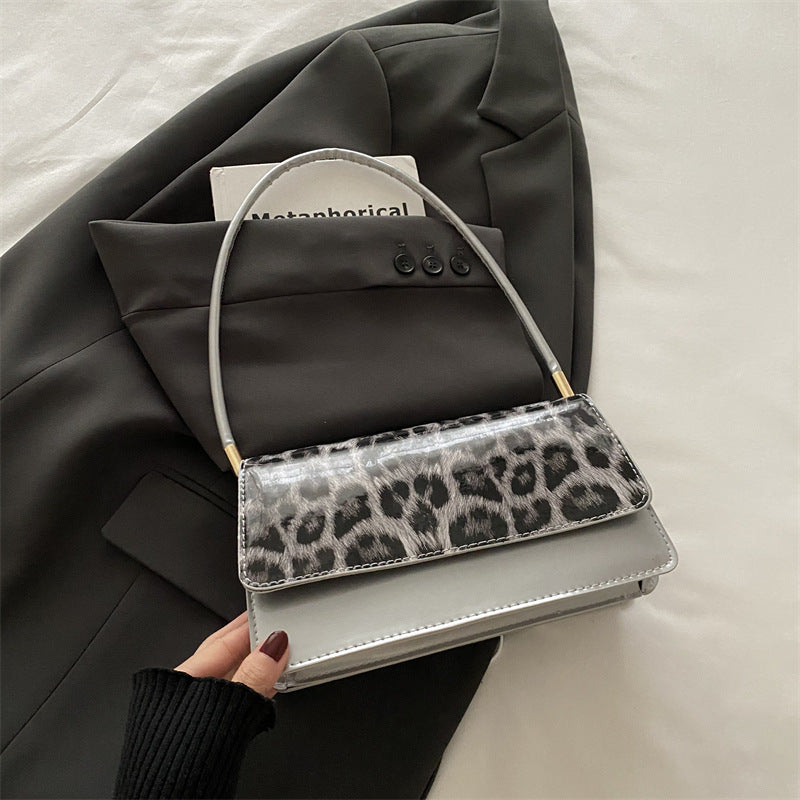 Skuldertaske med leopardprint til specifikke interesser