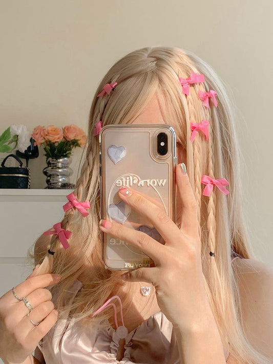 8 Pink Ribbon Bow Hair Clips On The Forehead