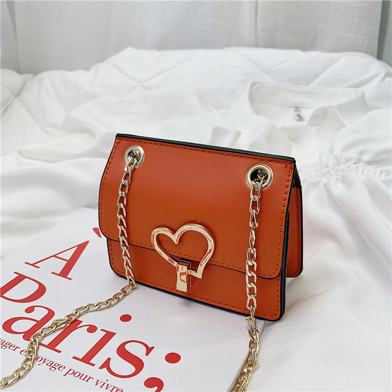 Children's Solid-color Shoulder Bag Fashion Love Hardware Decoration