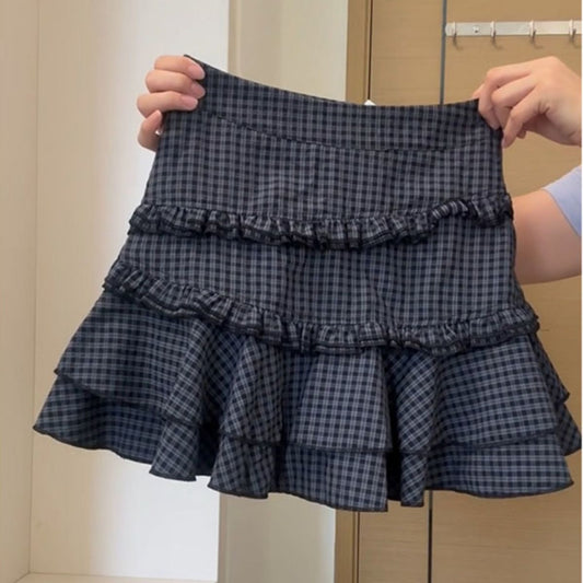 Retro Frisk Og Moderigtig Skirt Med A-linje I Skotsktern