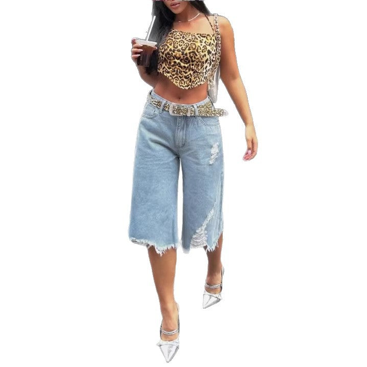 Slanke, stilfulde denim capri-jeans med afslappet pasform og et strejf af niche