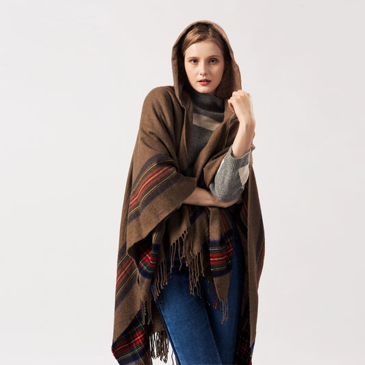 Keep warm by adding a stylish hooded cape