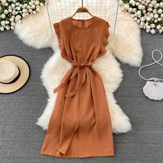 Refined Preppy-style Lady With An Elegant Feminine Look Adorned With Ruffled Cuffs