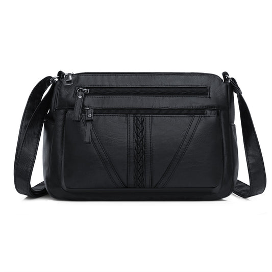 Crossbodytaske i blødt læderlook
