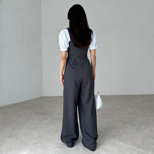 Ensfarvet højtaljet løs jumpsuit med vide ben og uden ærmer