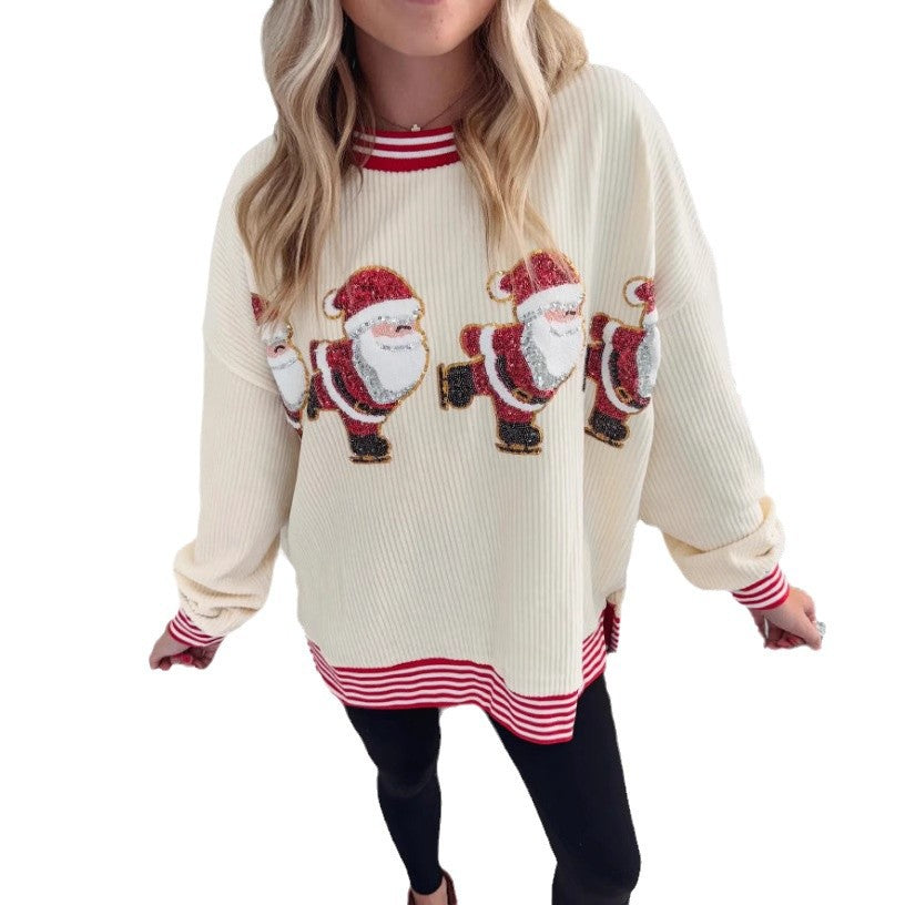 Julesweater med skøjtende julemand, pailletter og forgyldning
