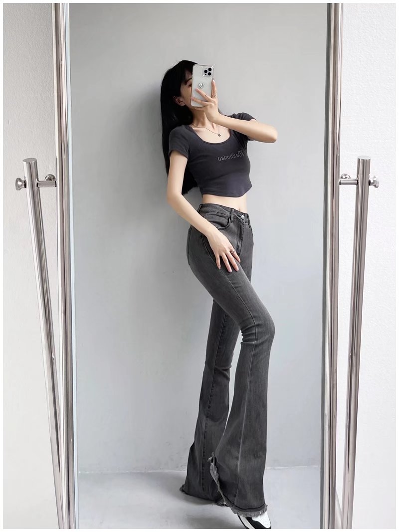 Efterårs- og vintermode Små højtaljede råkant-jeans Retro distressed små mænd strækbare bootcut-bukser