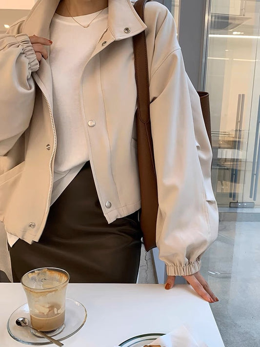 Solid Color Relaxed Fit Top With A Stand Up Collar