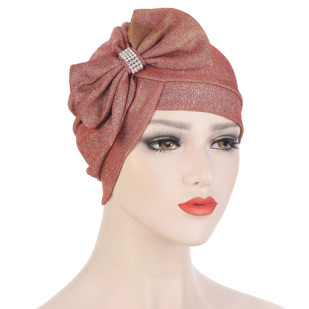 Headband Hat With A Large Cross Bow On The Forehead