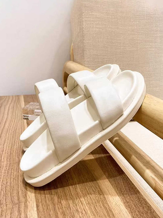 Hjemmesko i ægte læder med ensfarvet design
