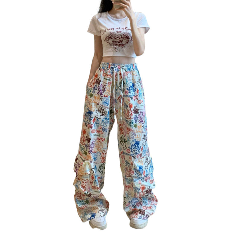 Farverige overalls med graffitiprint til kvinder