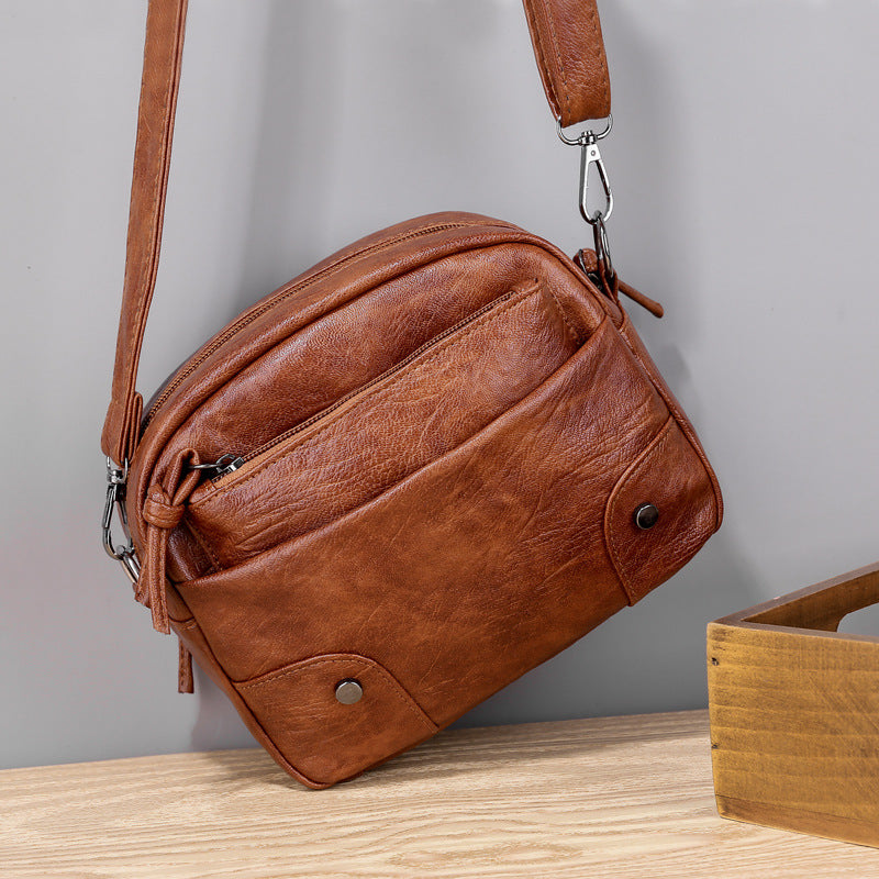 Simple Retro Multi-compartment Travel Fashion Messenger Bag