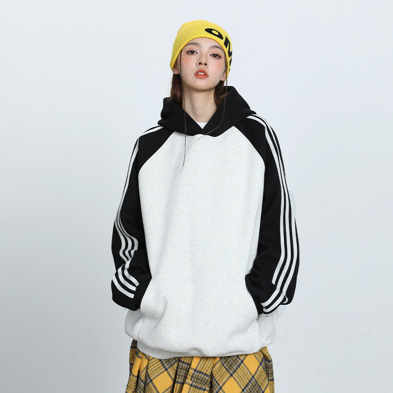 Herre- og dame-stribet kontrastfarve syet raglan-top