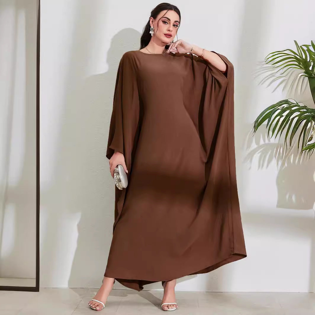 Long Dress With Tie Details Batwing Sleeves And A Round Necklinestylish And Elegant