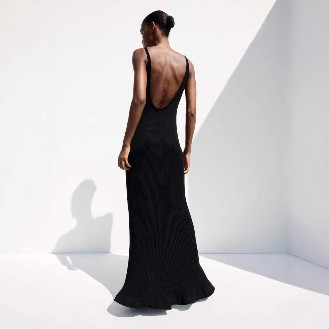 Long Sleeveless Ruffled Knit Dress