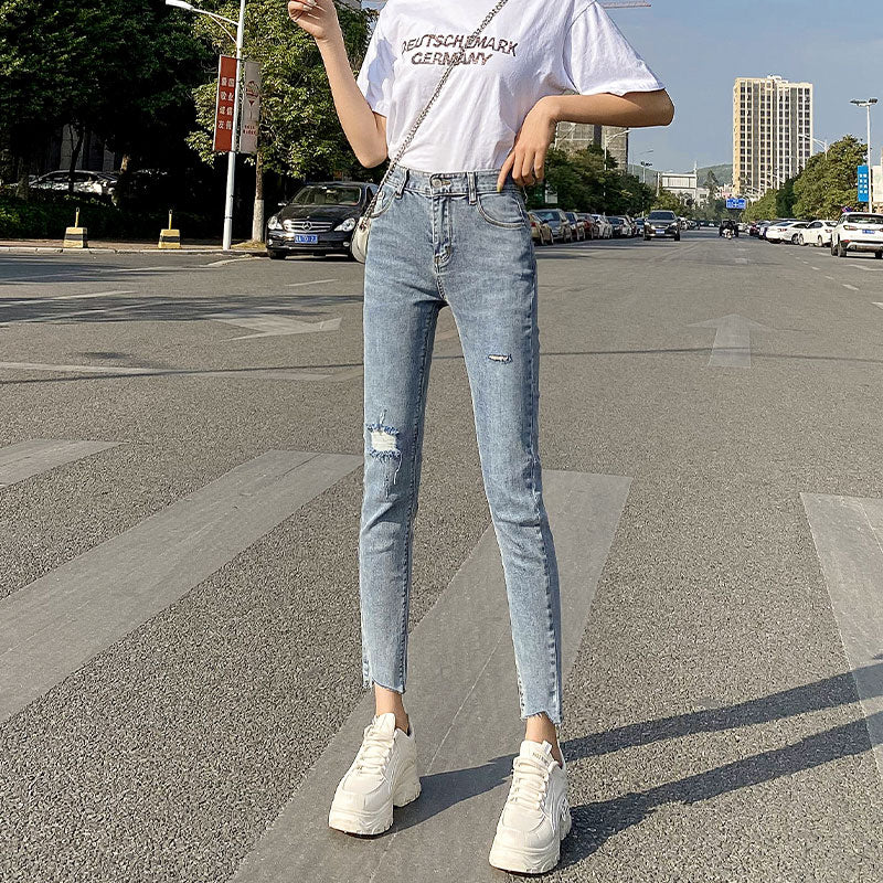 Lyseblå Ripped Jeans Til Kvinder Tynde Og Lange Ni-punkts Pencil Benbukser