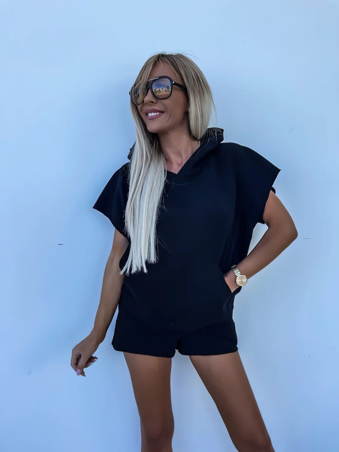 Casual, Relaxed-fit Hoodie With A Hood And Pockets Paired With Elastic Waist Shorts