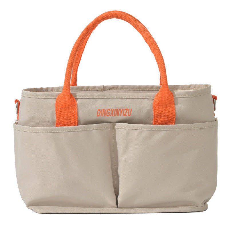 Mommy's Maternity Bag Can Be Attached To A Stroller