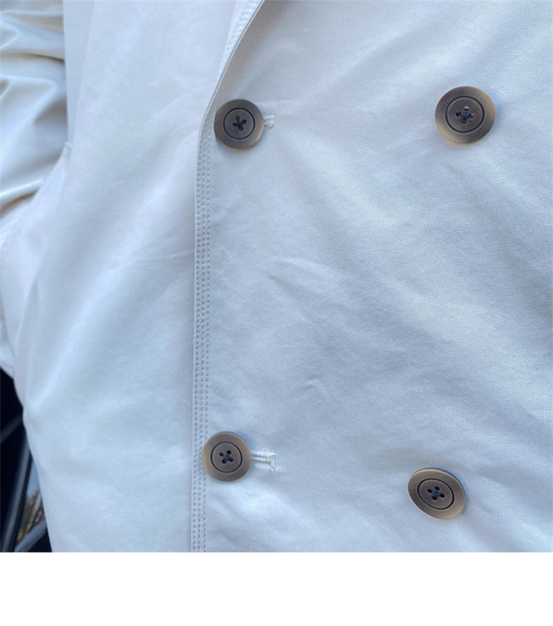 Pendler trenchcoat i mellemlang længde med dobbeltradet revers
