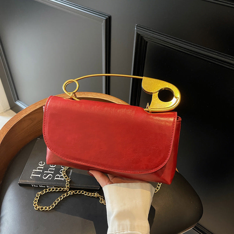 Kreativ skuldertaske med papirclips