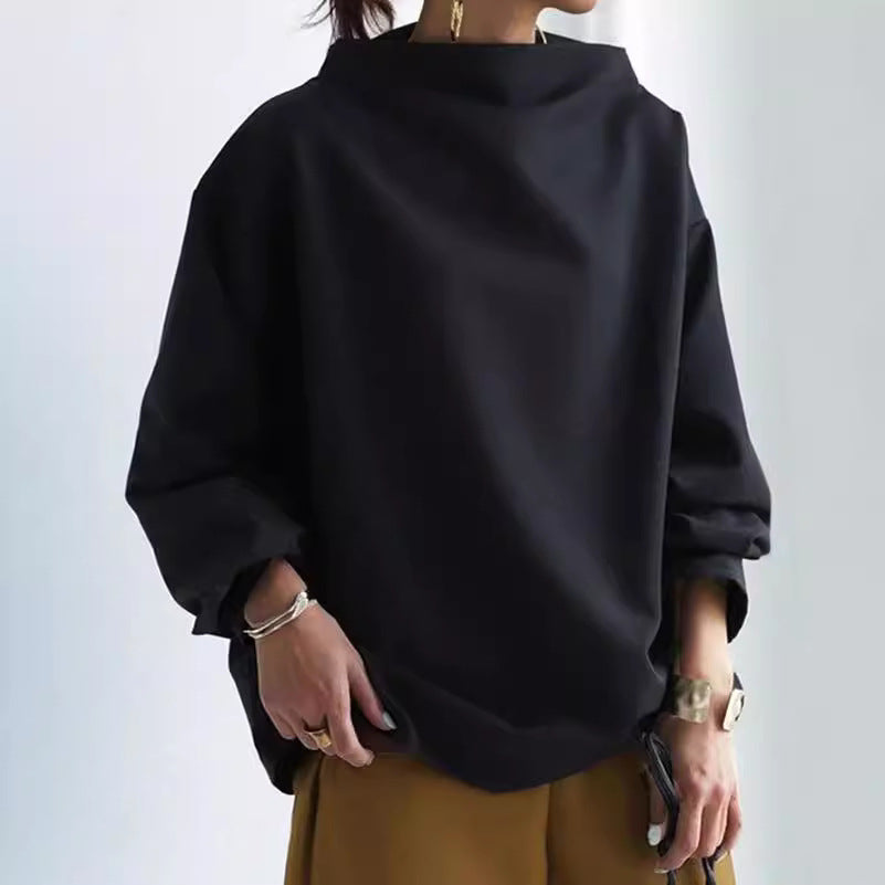 Ensfarvet løs casual top til kvinder