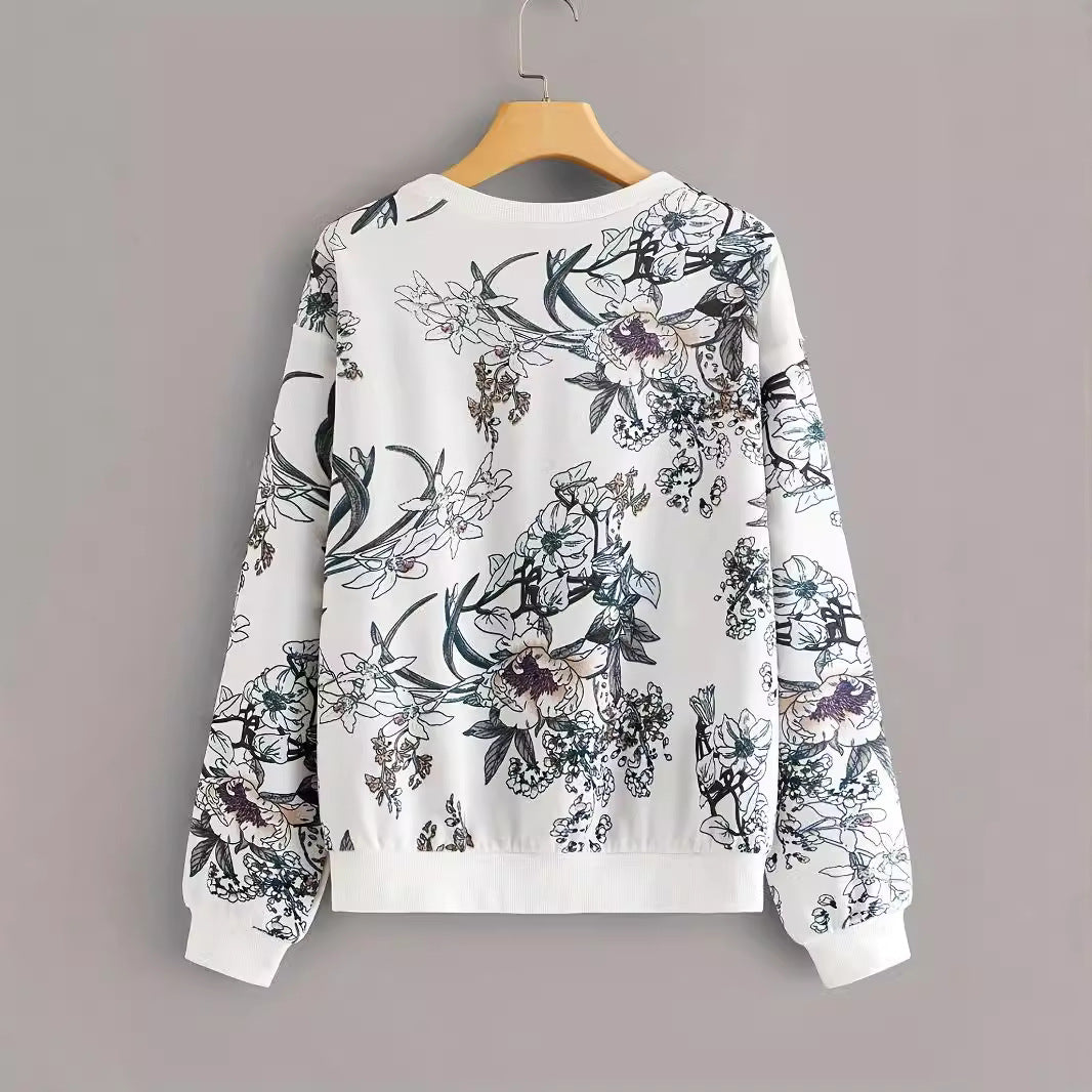 Rundhalset Sweater med Blomsterprint og Drop Shoulder